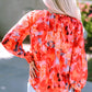 Fiery Red Floral Print Split Neck Tassel Tie Blouse